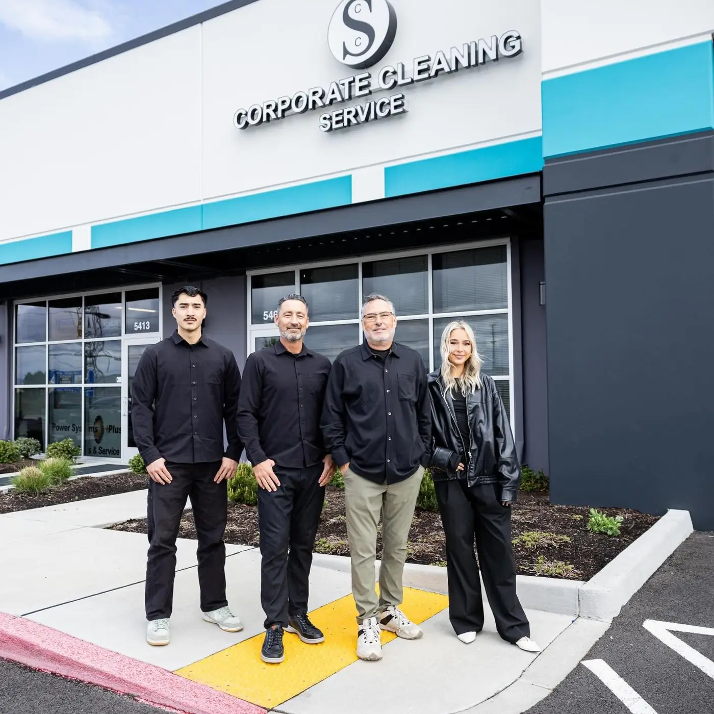 The Corporate Cleaning team standing outside the Hillsboro office